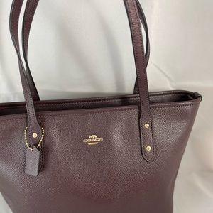 Coach {Chocolate}  leather Handbag. With leather story patch